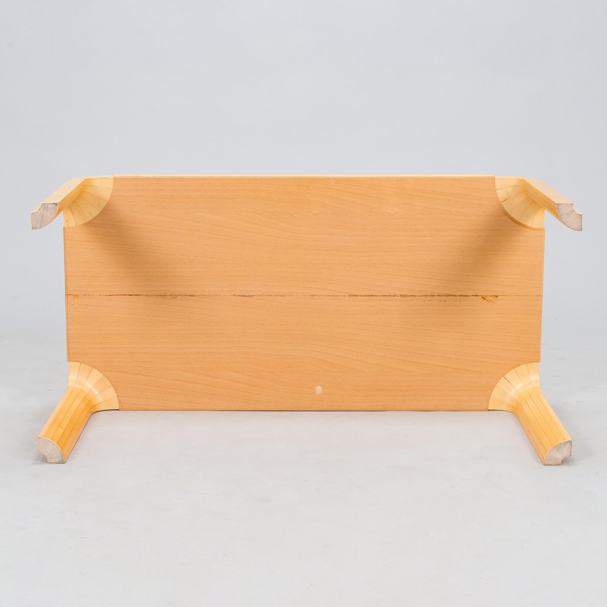 Alvar Aalto, a 1960s coffee table model MX800B, altered, for Artek.