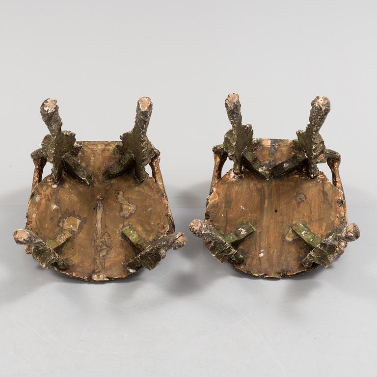 A pair of 20th century grotto armchairs.