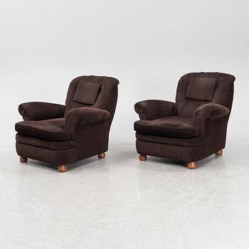 A pair of model 336 lounge chairs by Josef Frank for Firma Svenskt Tenn, designed 1934.