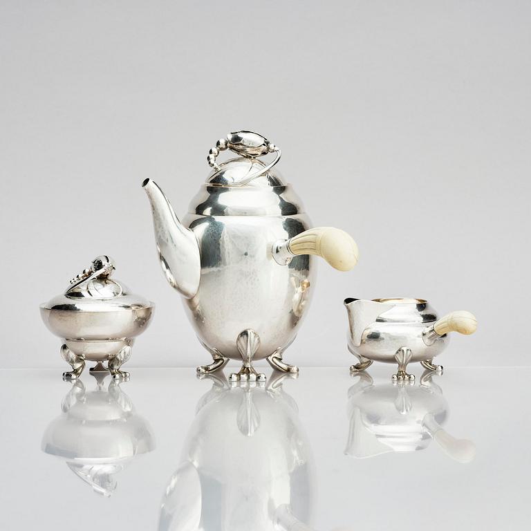 Georg Jensen, a three pieces coffee service in sterling silver, "Magnolia/Blossom", Copenhagen 1933-44.