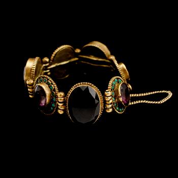 ARMBAND, mässing och turkoser, 1900-talets första hälft.