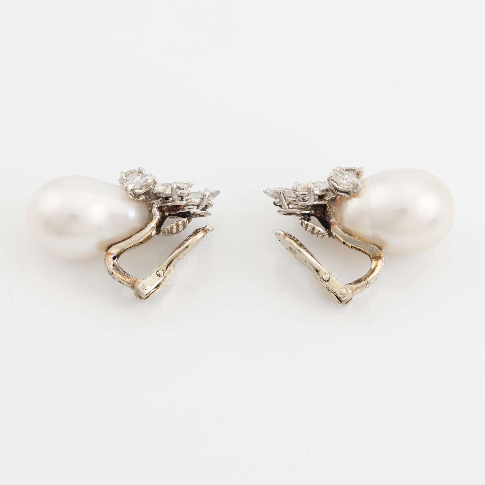 Van Cleef & Arpels a pair of earrings with drop-shaped cultured pearls and marquise and round brilliant-cut diamonds.