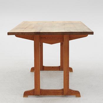 A Mid 20th Century Pinewood Dining Table.