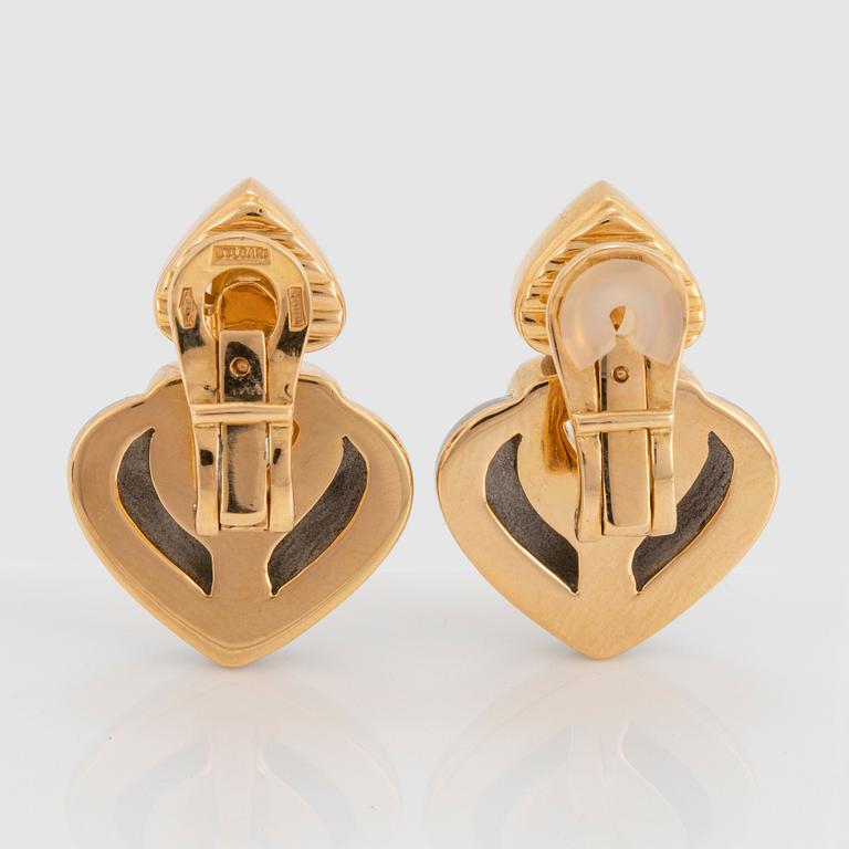 A pair of 18K gold and steel Bulgari earrings.