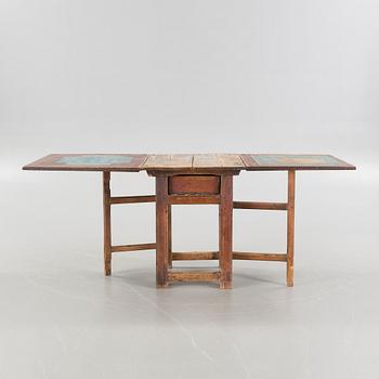 A mid 19th century gateleg table.