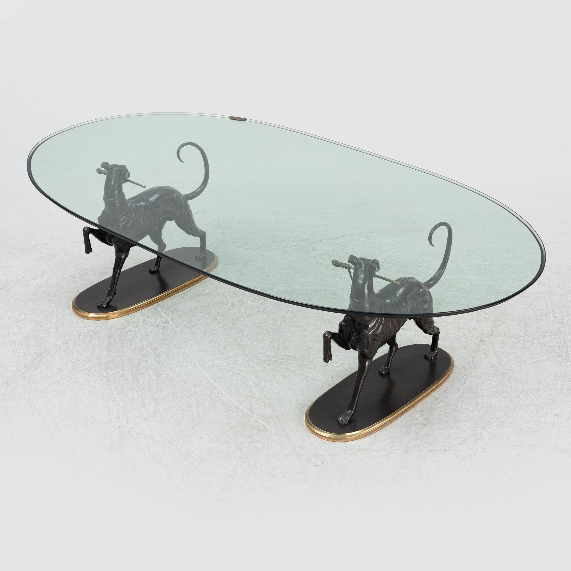 A glass and bronze coffee table, later part of the 20th century.