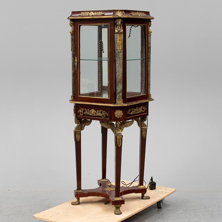 An Empire style cabinet, mid 20th Century.