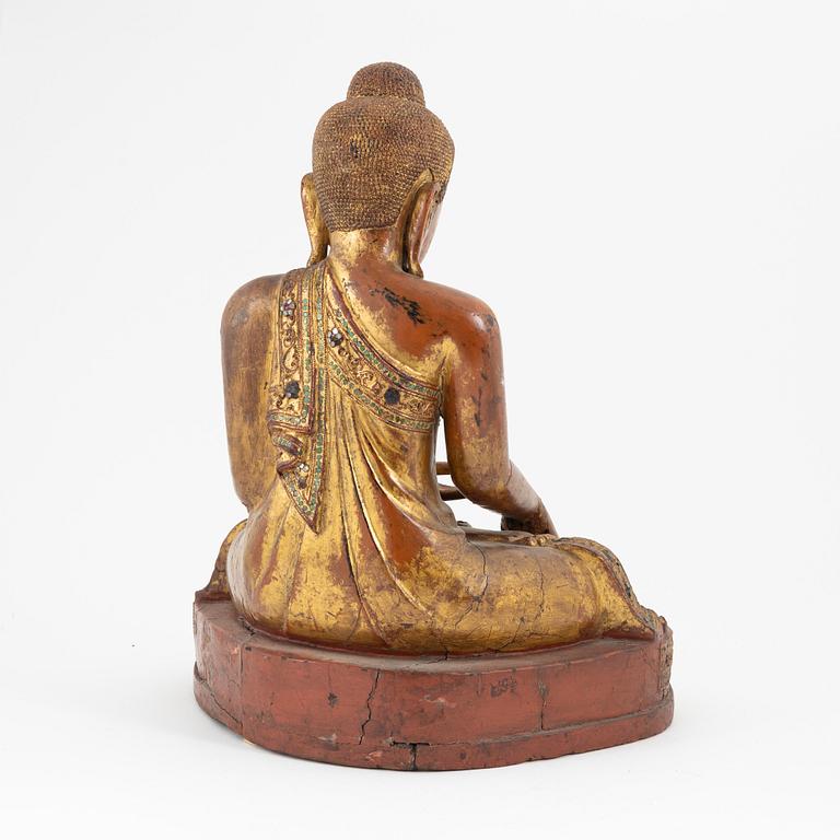 A seated wood Buddha, Thailand, 20th century.