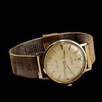 HERRARMBANDSUR, guld på stål, "seamaster", Omega. 1960-tal.