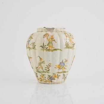 A faience pot, 18th century.