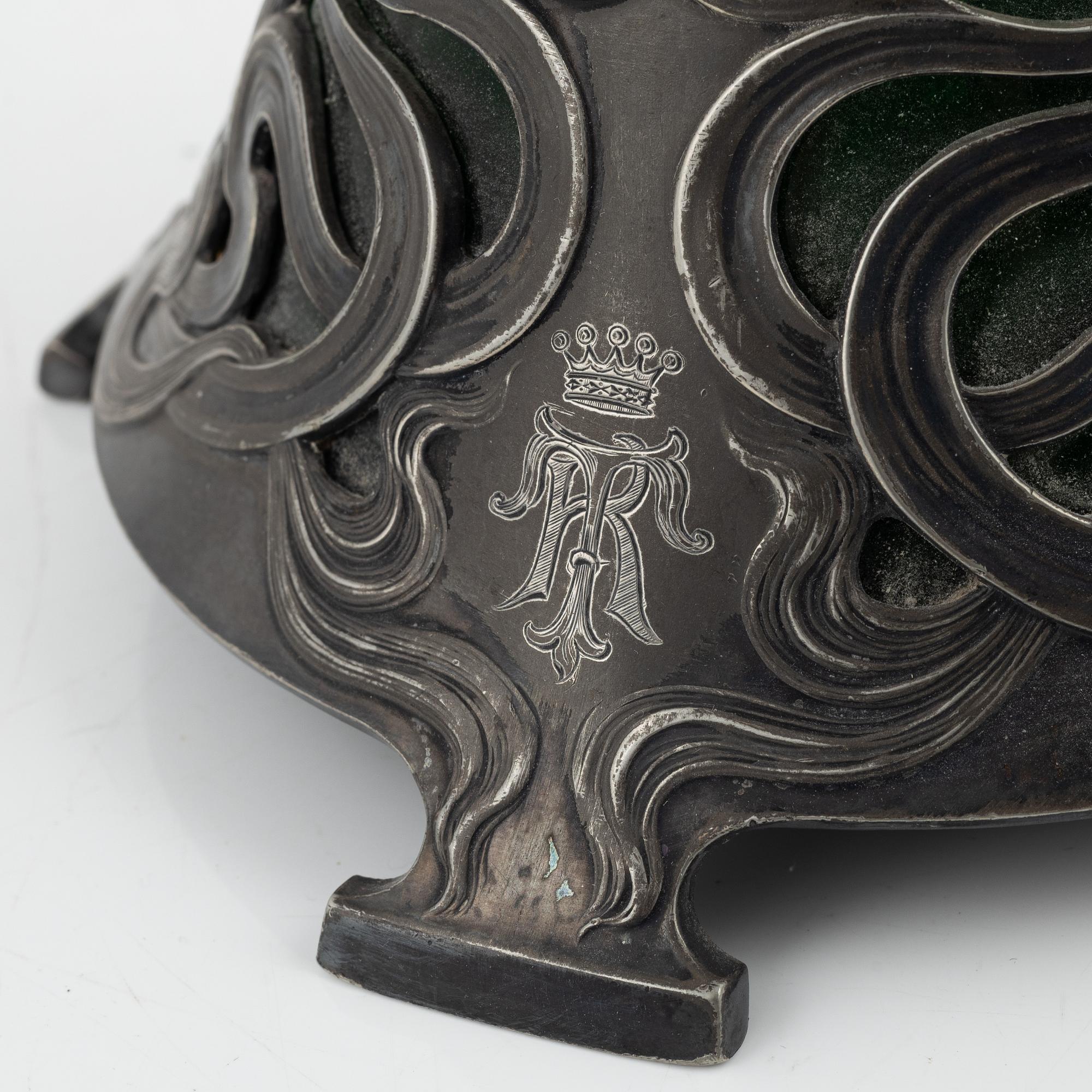 A silver plate and glass decanter, Art Nouveau, early 20th century.