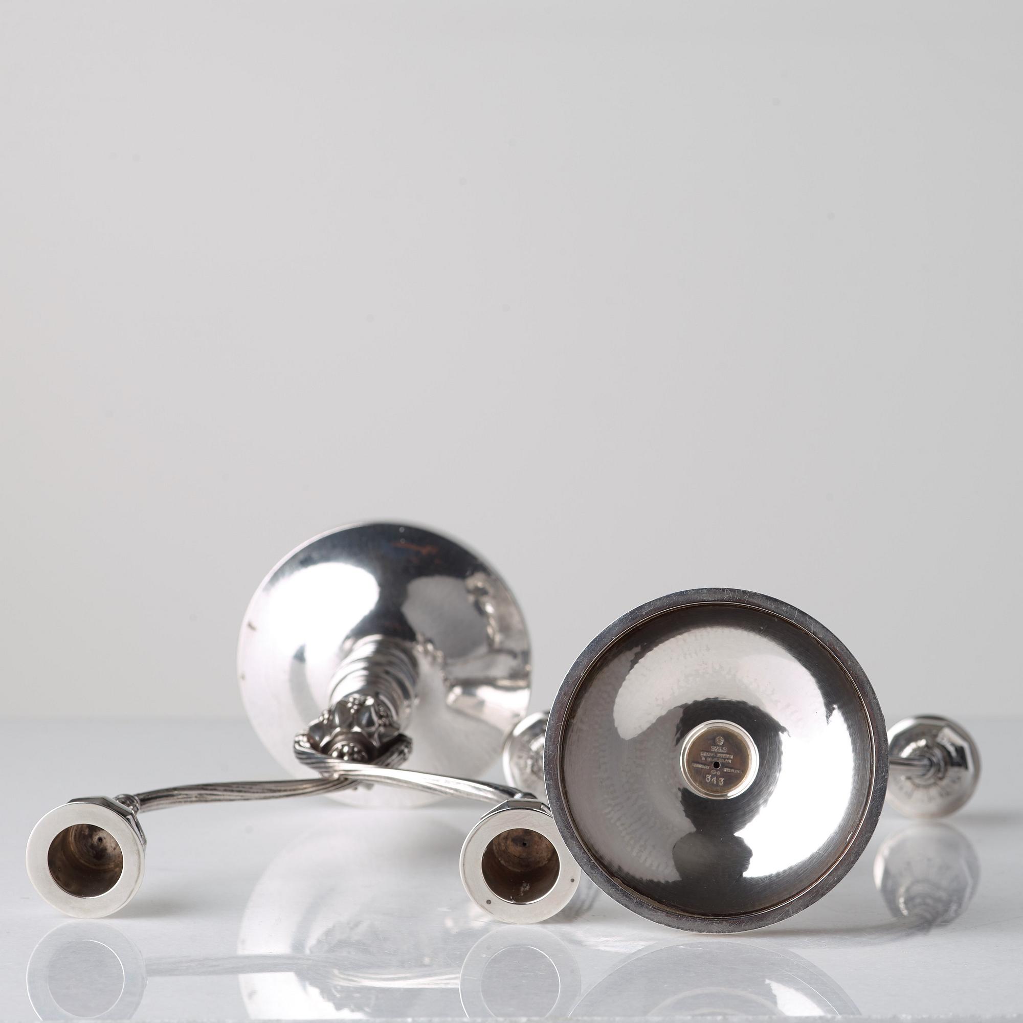 Johan Rohde, a pair of sterling candelabra, design nr 343 for Georg Jensen & Wendel, Denmark 1945-51.