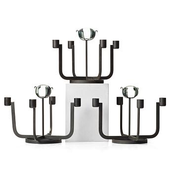 Gunnar Ander, a set of three iron and glass candlesticks for Ystad Metall, Sweden, mid 20th century.