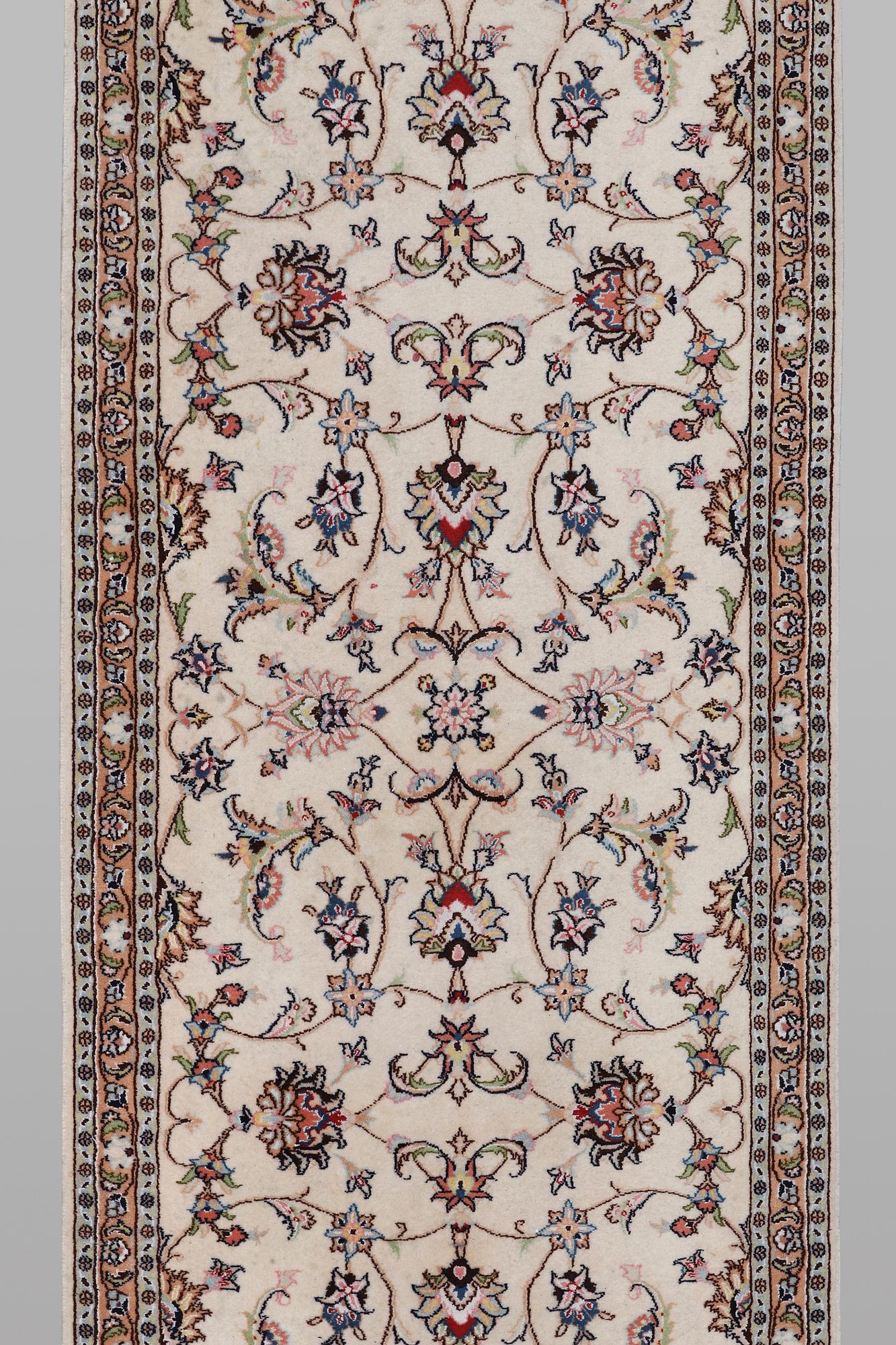 A runner carpet, Kashan, ca 380 x 86 cm.