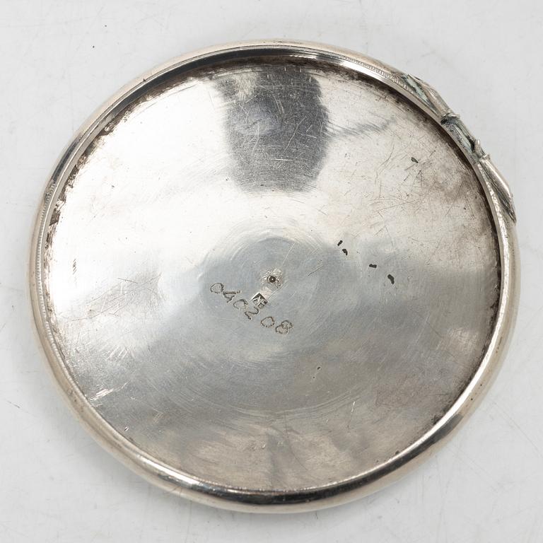 Two silver buttons, a belt buckle, an armring and a box, Persia, first part of the 1900s.