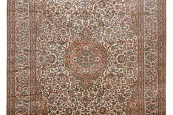 A carpet, silk Kashmir, ca 303 x 216 cm.