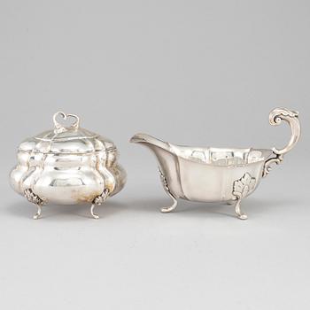 A rococo-style 20th century silver cream-jug and sugar-box, Swedish import marks.