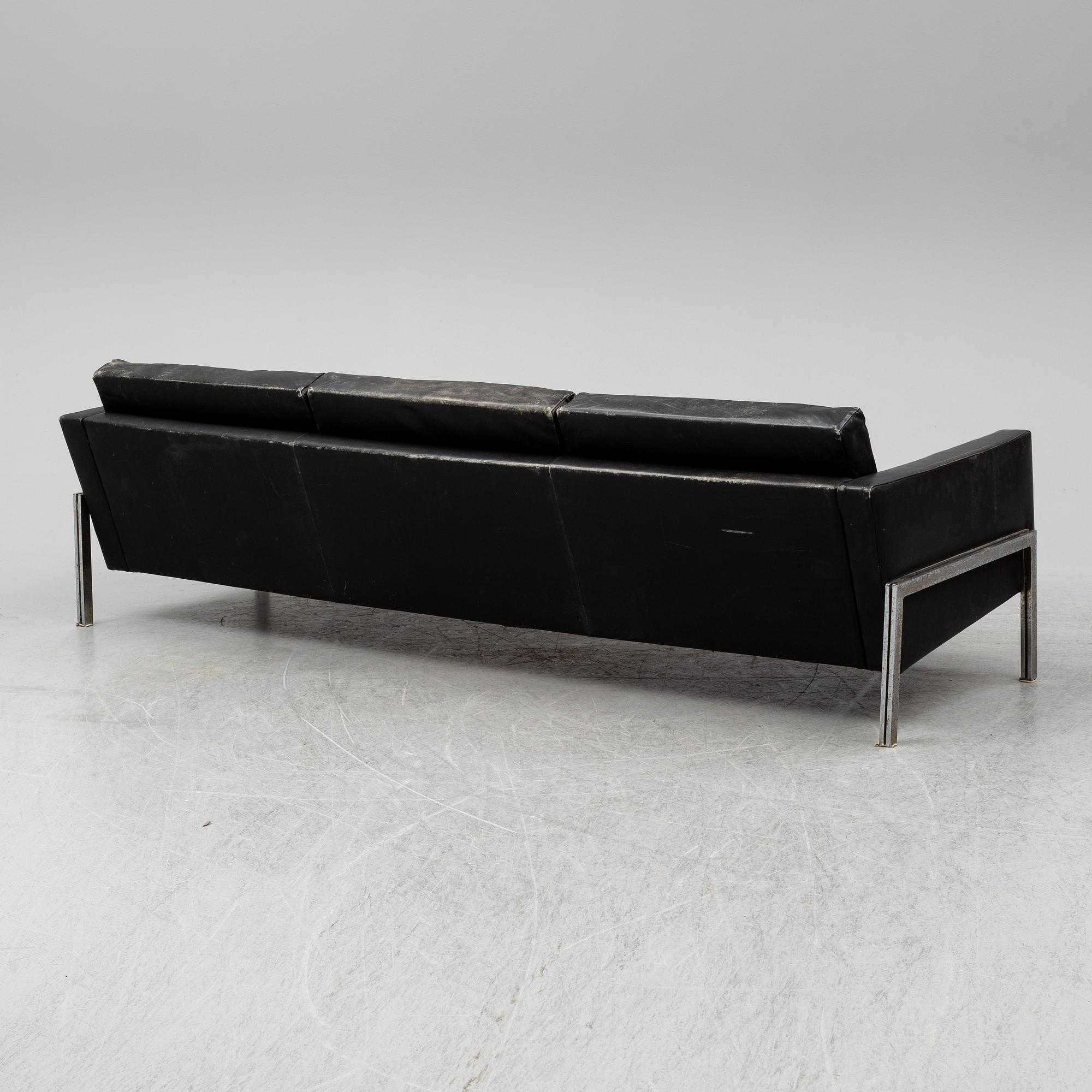 A 1960's leather covered sofa.
