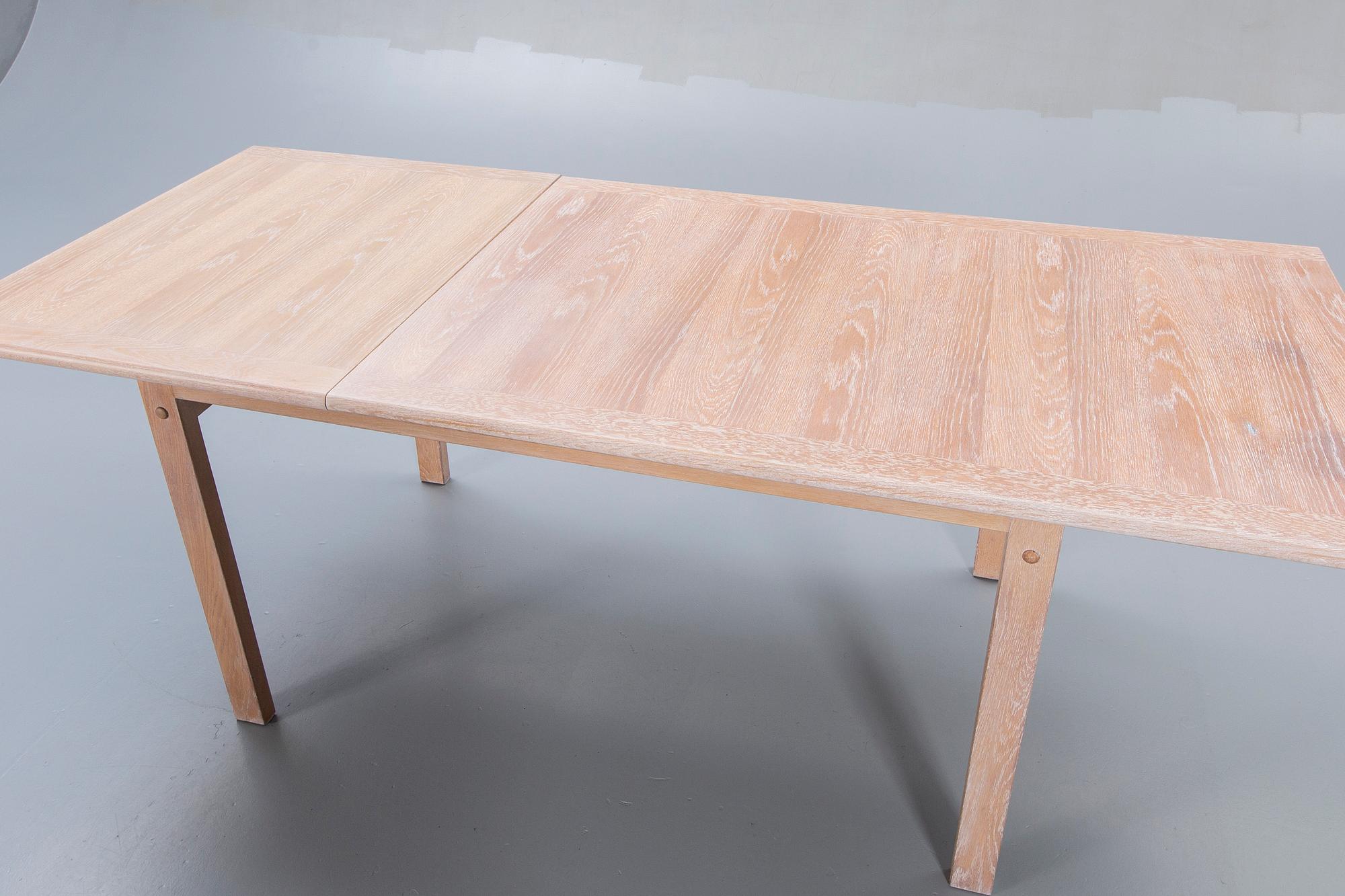 A Danish 1960s dining table and 6 chairs,