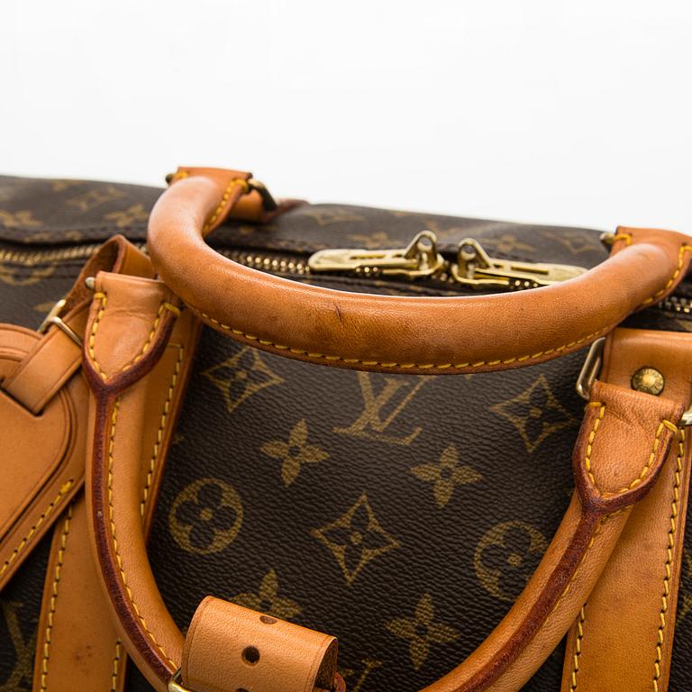 Louis Vuitton, a Monogram Canvas 'Keepall 55 Bandoulière' weekend bag.