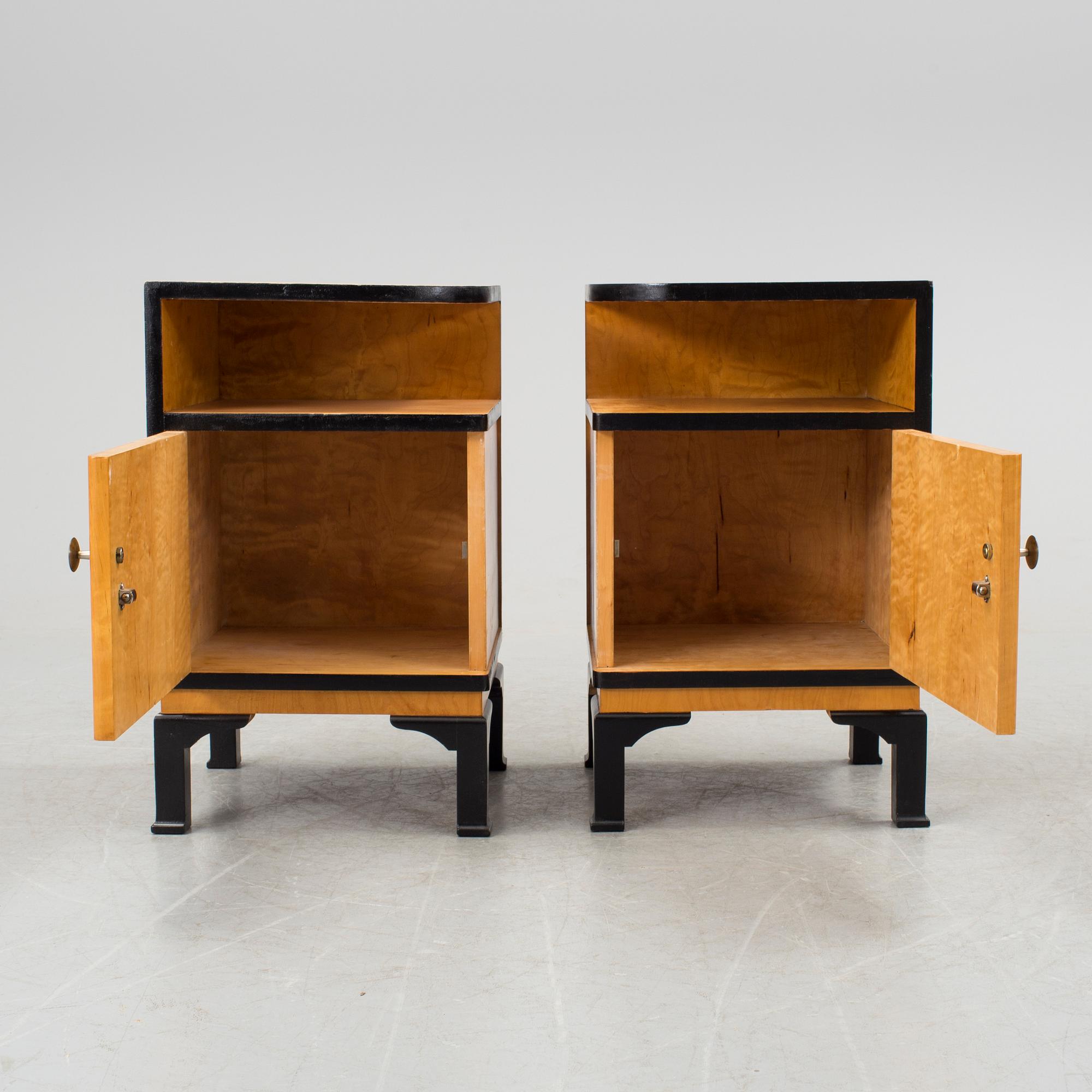 A pair of art déco bedside tables.