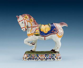 A Delft faience figure of a horse by Jacobus Adraensz Halder, end of 18th Century.