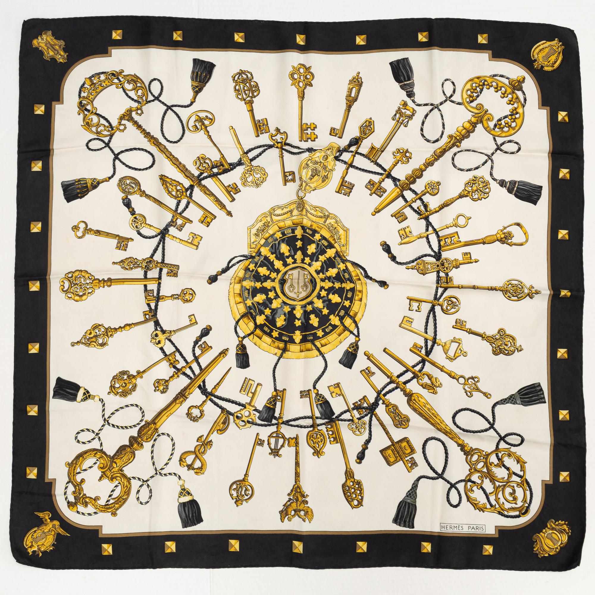 Hermès, a 'Les Clefs' silk scarf.