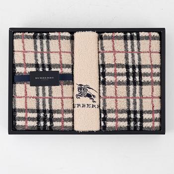 Burberry, a set of three towels.