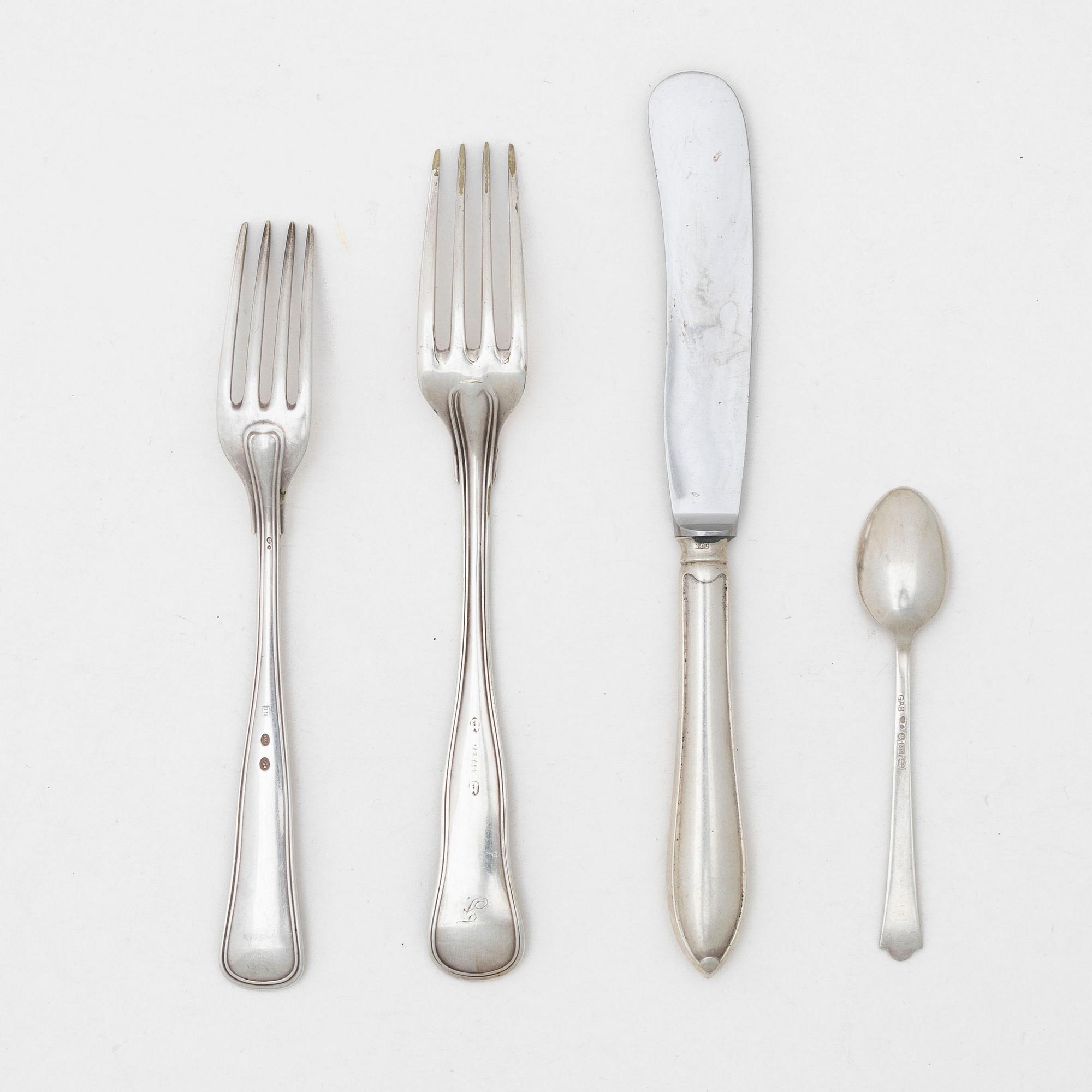 21 pieces of silver cutlery, 20th century.
