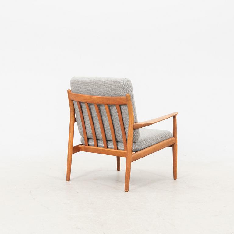 A Grete Jalk teak armchair and sofa from Glostrup Denmark, 1960s, marked.