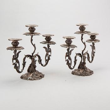 A pair of Swedish silver candelabra mark of GUSTAF MÖLLENBORG Stockholm 1846 , total weight ca 4420 gr, height 31 cm.