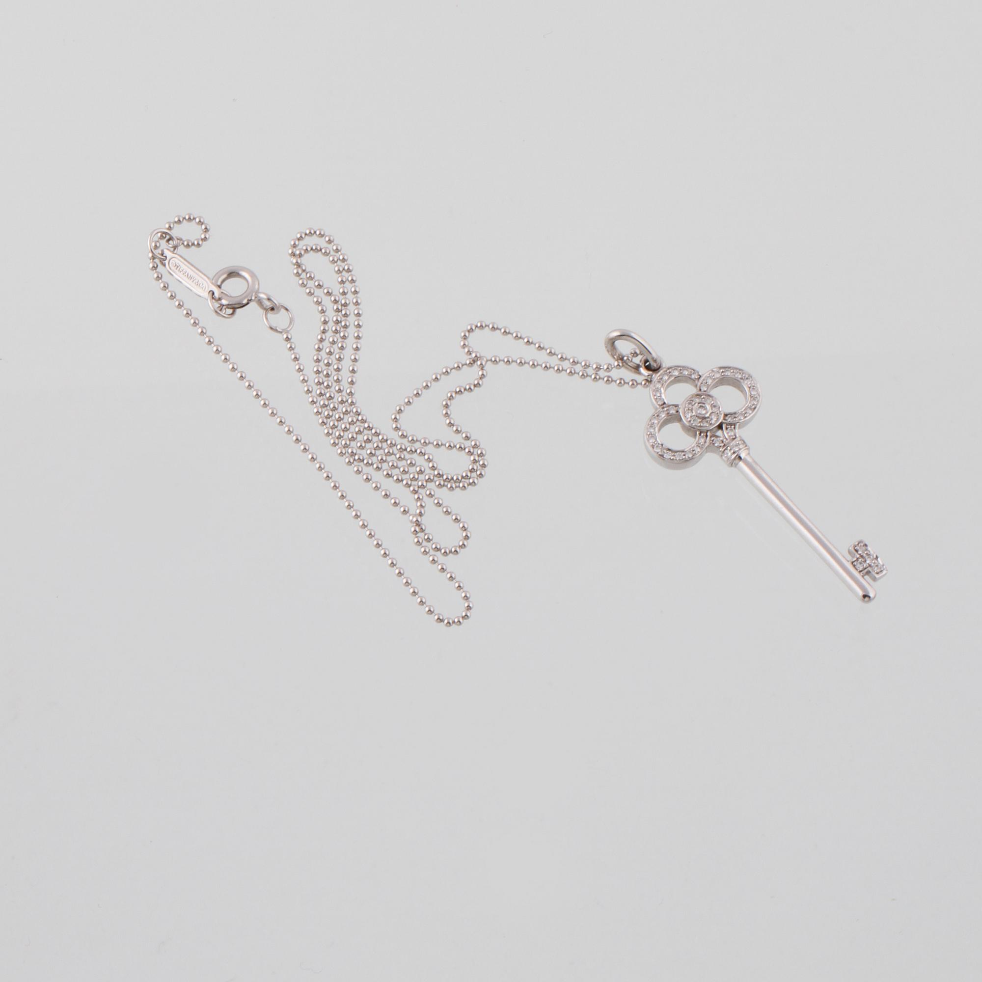 HÄNGE, 18K vitguld med briljantslipade diamanter, Tiffany & Co. Vikt 5,2 gram.