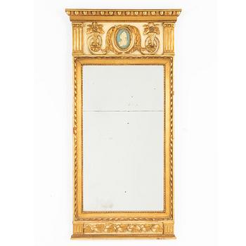 A Gustavian style mirror, circa 1900.