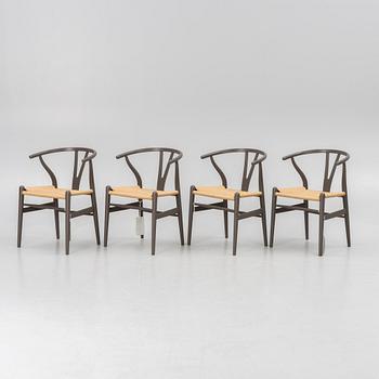 Hans J. Wegner, four CH 24 chairs, Carl Hansen & Son, Denmark.