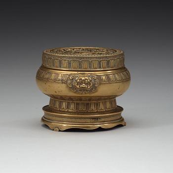 A bronze censer with cover and stand, 17th/18th Century, with Xuandes six character mark.