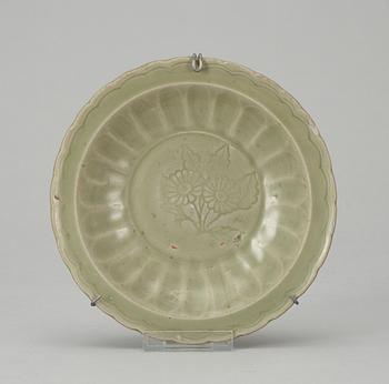 301. A celadon green Ming porcelain plate.