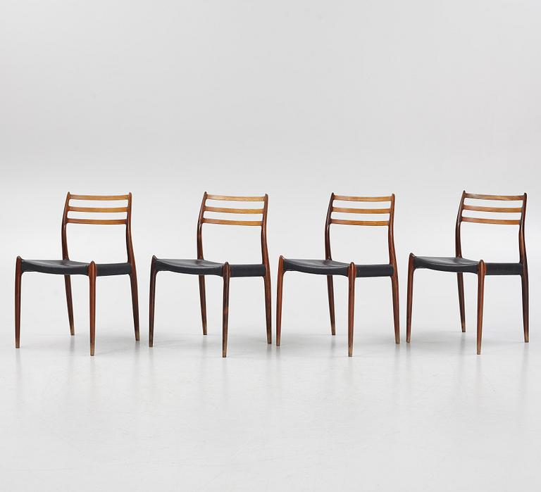 Niles Otto Møller, a rosewood veneered table with four chairs, JL Møller, Denmark, 1950's/60's.