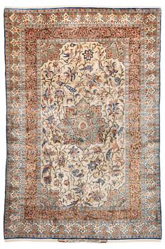 491. A semi-antique silk Isfahan rug, Central Persia, signed (Sadegh) Seirafian, c. 209 x 142 cm.
