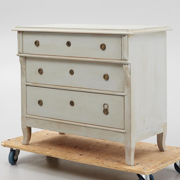 A chest of drawers, circa 1900.