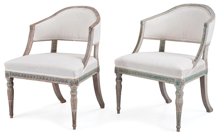 A pair of late Gustavian armchairs, circa 1800.