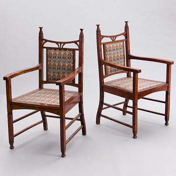 A pair of early 20th Century Jugend style open armchairs.