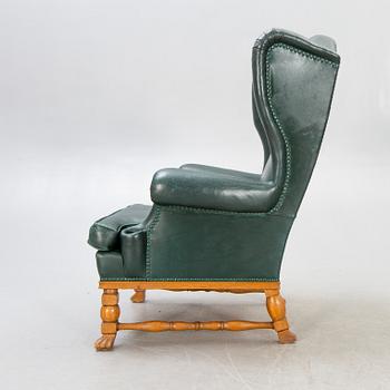 A  mid 1900s leather armchair.
