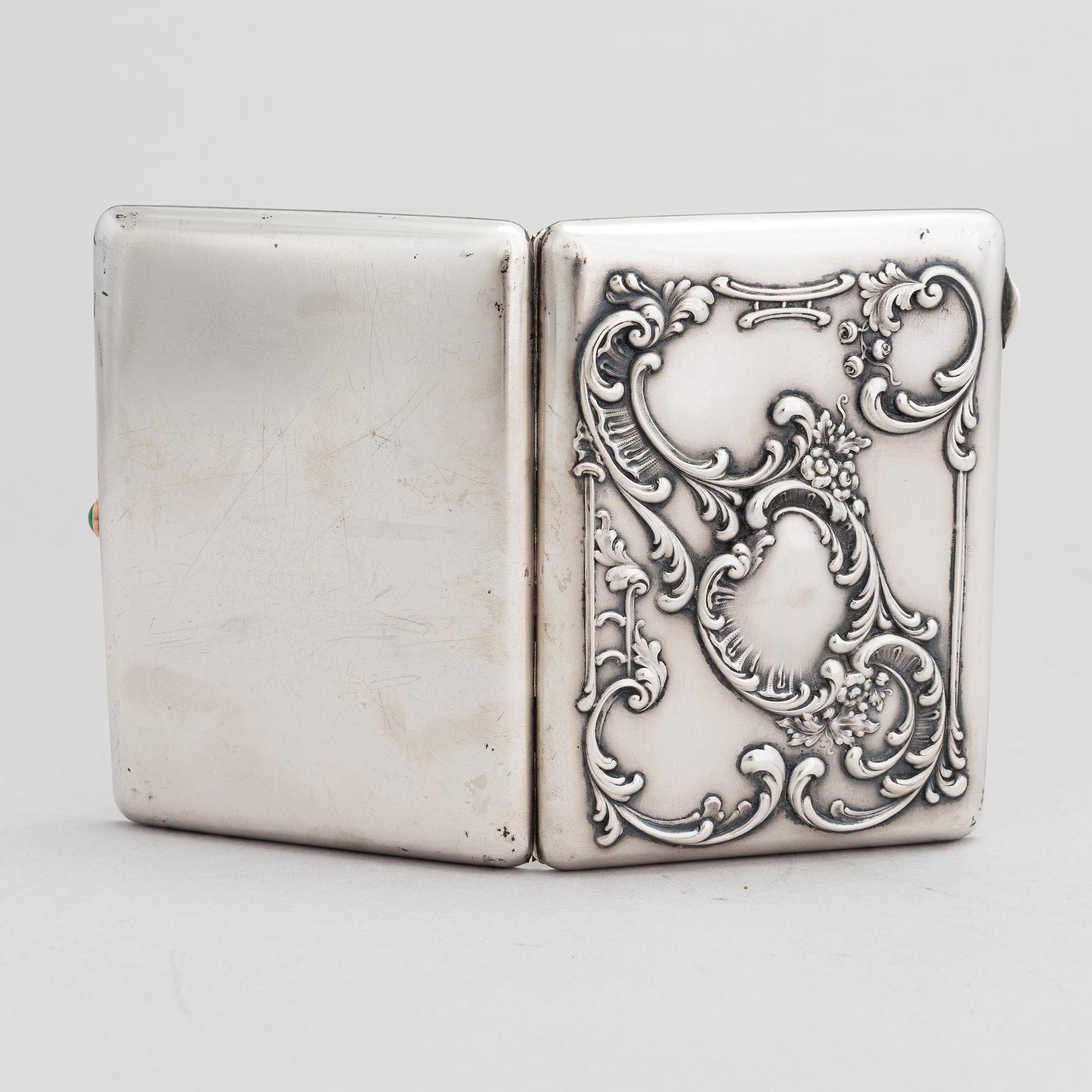 A Russian silver cigarette case, maker's mark of Mikhail Tarasov, Moscow 1908-14.