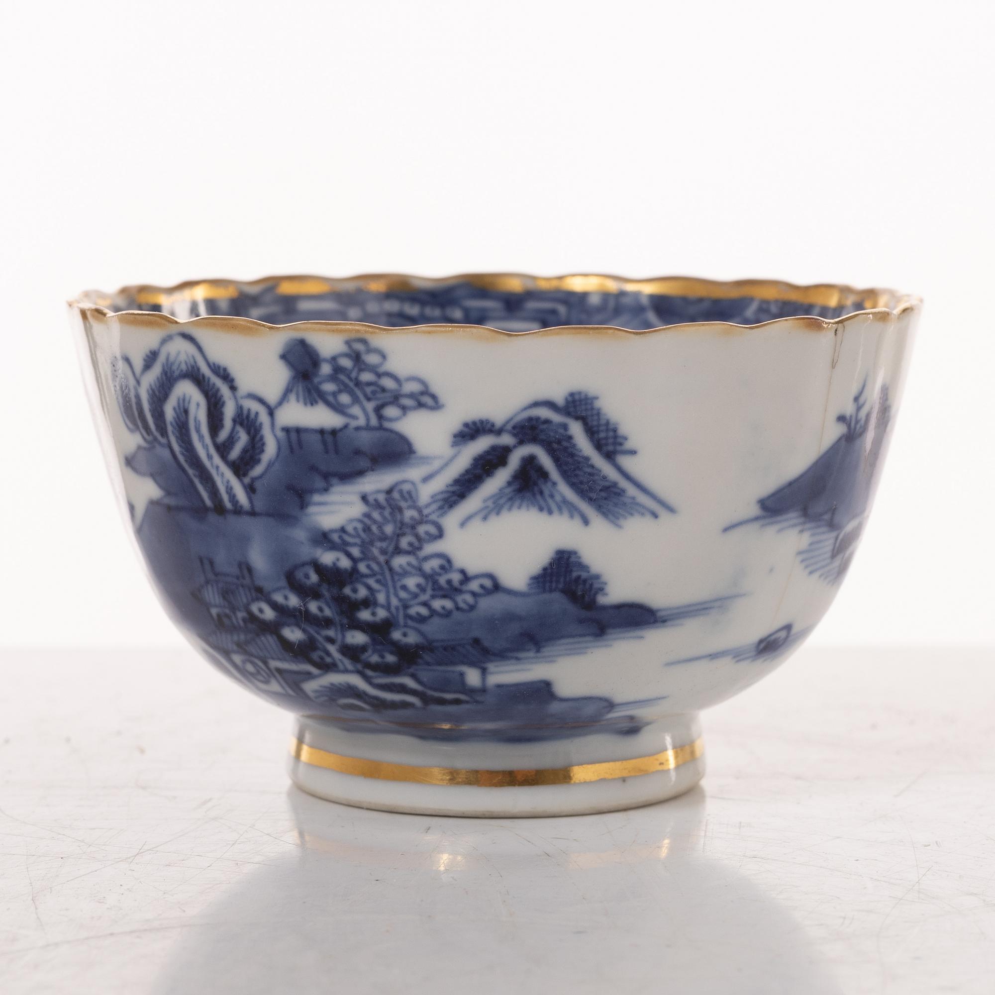 A group  of three serving dishes, a serving bowl, a cup, and seven plates, porcelain, including China 18th century.