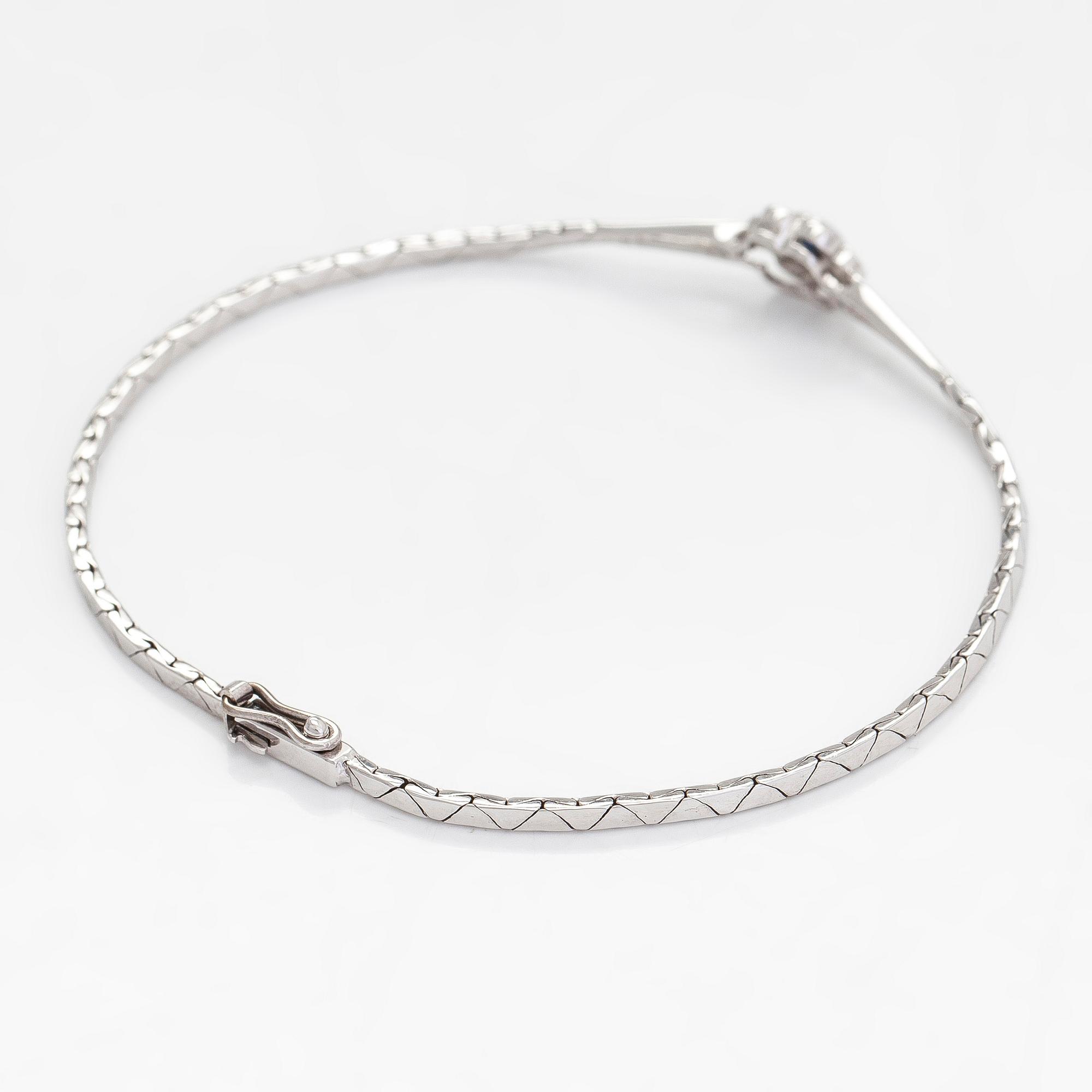Rannekoru, 14K kultaa safiiri ja timantteja yht. n. 0.12ct. Tuontileimattu Westerback.
