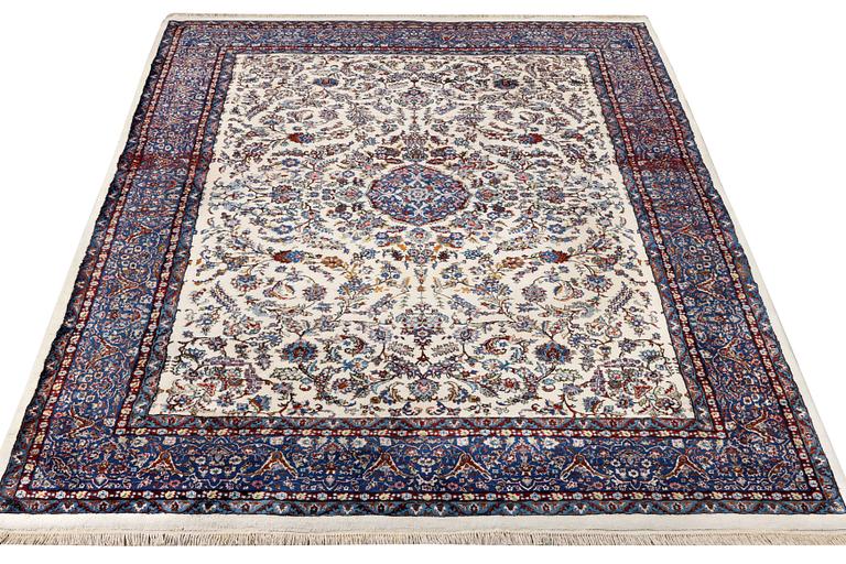 An oriental carpet, c. 308 x 220 cm.
