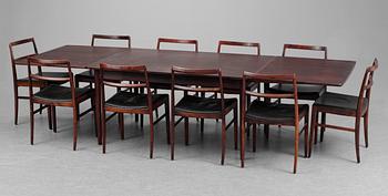 A Danish palisander dinner table with 10 chairs, black leather seats, 1960´s.