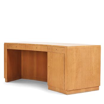 325. Axel Einar Hjorth, an ashwood veneered desk, Nordiska Kompaniet 1939. The model was designed in 1936.