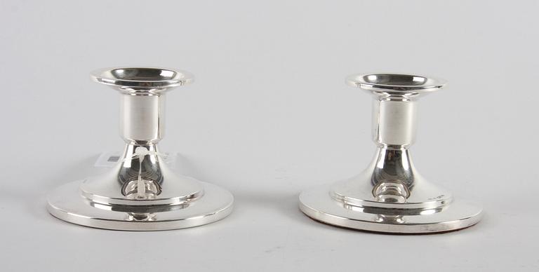 LJUSSTAKAR, ett par, silver, 1938.