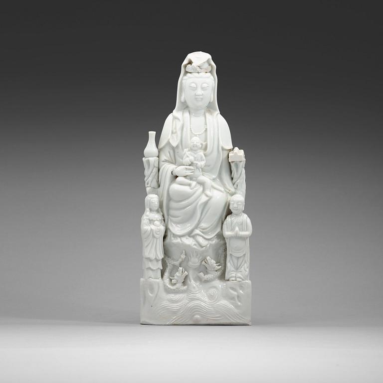A blanc de chine figure of Guanyin, late Qing dynasty (1662-1912).
